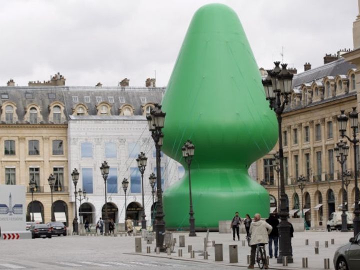 Gigantic green butt plug on public display